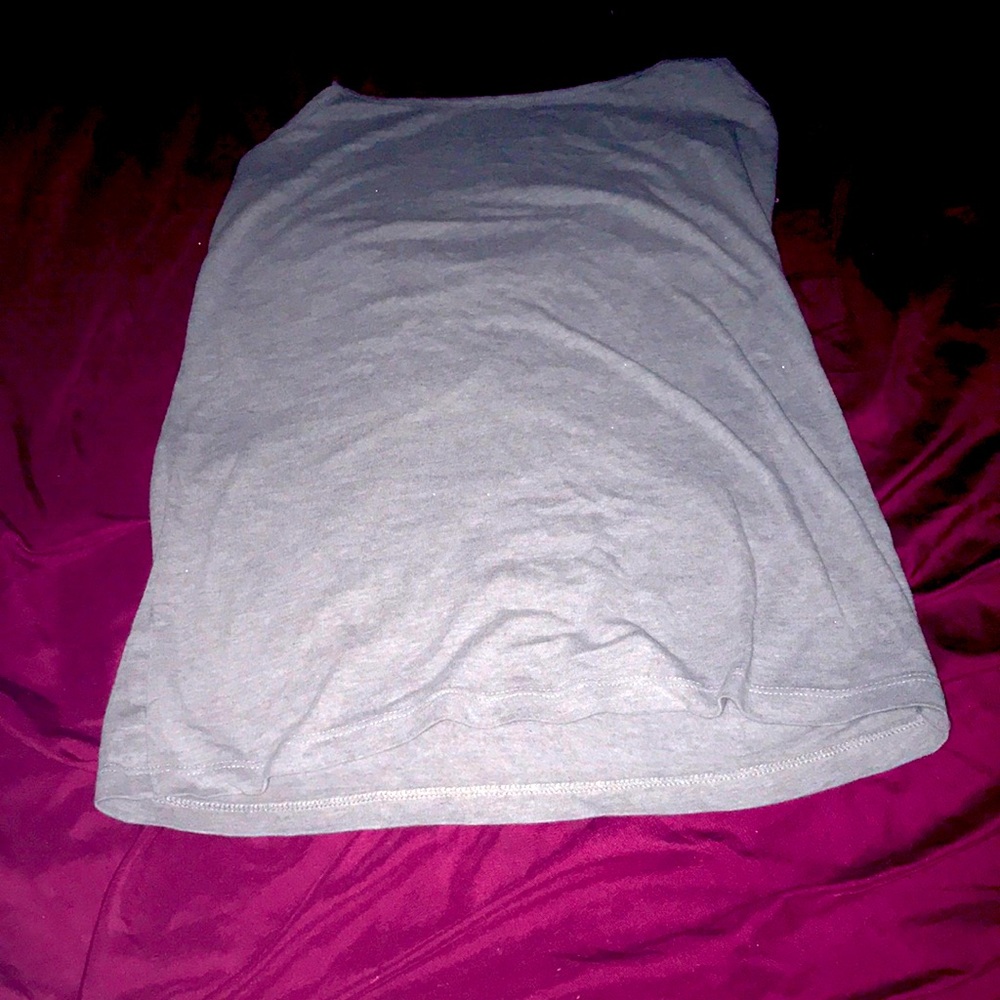 This is a scratchy grey tank top it’s straight
